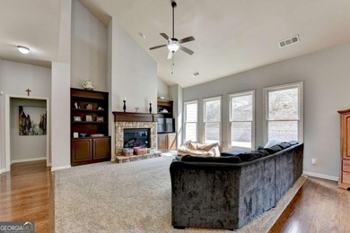 Rarely available primary-on-main floor bedroom plan in highly on Hampton Golf Village in Georgia - for sale on GolfHomes.com, golf home, golf lot