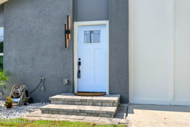 This fully renovated 4-bedroom, 2-bath home blends modern on Jacksonville Beach Golf Course in Florida - for sale on GolfHomes.com, golf home, golf lot