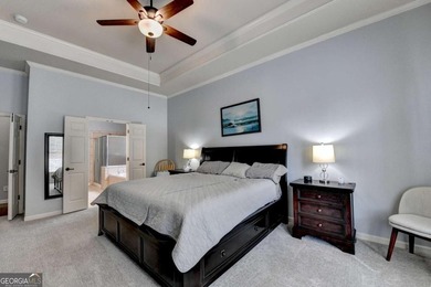 Rarely available primary-on-main floor bedroom plan in highly on Hampton Golf Village in Georgia - for sale on GolfHomes.com, golf home, golf lot