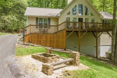 Discover comfort, convenience, and tranquil mountain living at on Sapphire National Golf Club in North Carolina - for sale on GolfHomes.com, golf home, golf lot