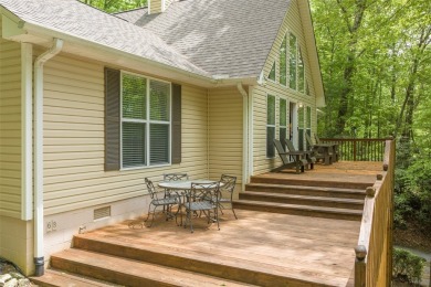 Discover comfort, convenience, and tranquil mountain living at on Sapphire National Golf Club in North Carolina - for sale on GolfHomes.com, golf home, golf lot