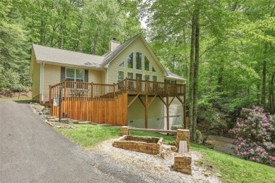 Discover comfort, convenience, and tranquil mountain living at on Sapphire National Golf Club in North Carolina - for sale on GolfHomes.com, golf home, golf lot