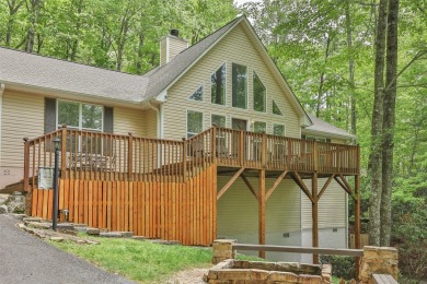 Discover comfort, convenience, and tranquil mountain living at on Sapphire National Golf Club in North Carolina - for sale on GolfHomes.com, golf home, golf lot