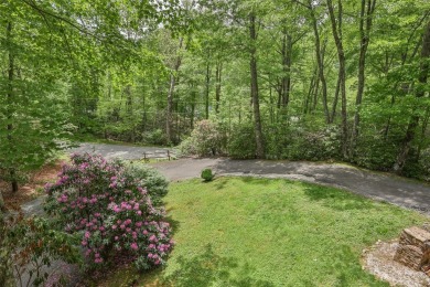 Discover comfort, convenience, and tranquil mountain living at on Sapphire National Golf Club in North Carolina - for sale on GolfHomes.com, golf home, golf lot