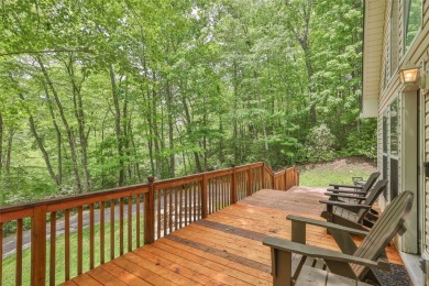 Discover comfort, convenience, and tranquil mountain living at on Sapphire National Golf Club in North Carolina - for sale on GolfHomes.com, golf home, golf lot