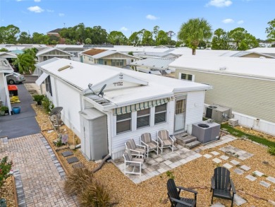 Enjoy deeded ownership and resort-style living in this cozy on Deer Creek RV Golf Resort in Florida - for sale on GolfHomes.com, golf home, golf lot
