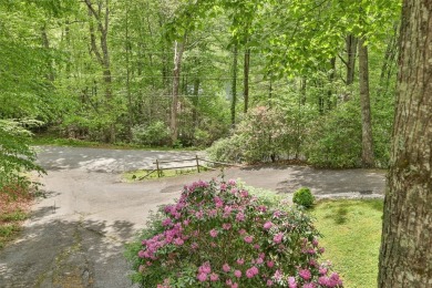 Discover comfort, convenience, and tranquil mountain living at on Sapphire National Golf Club in North Carolina - for sale on GolfHomes.com, golf home, golf lot
