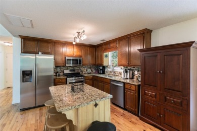 Discover comfort, convenience, and tranquil mountain living at on Sapphire National Golf Club in North Carolina - for sale on GolfHomes.com, golf home, golf lot