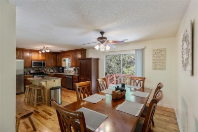Discover comfort, convenience, and tranquil mountain living at on Sapphire National Golf Club in North Carolina - for sale on GolfHomes.com, golf home, golf lot