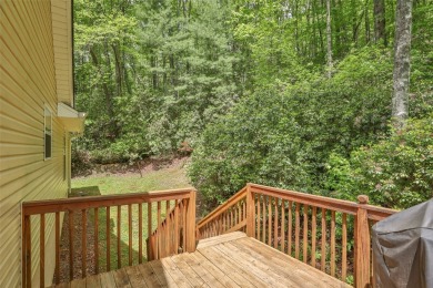 Discover comfort, convenience, and tranquil mountain living at on Sapphire National Golf Club in North Carolina - for sale on GolfHomes.com, golf home, golf lot
