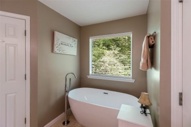 Discover comfort, convenience, and tranquil mountain living at on Sapphire National Golf Club in North Carolina - for sale on GolfHomes.com, golf home, golf lot