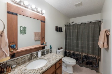 Discover comfort, convenience, and tranquil mountain living at on Sapphire National Golf Club in North Carolina - for sale on GolfHomes.com, golf home, golf lot