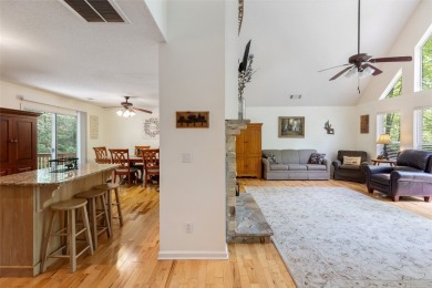 Discover comfort, convenience, and tranquil mountain living at on Sapphire National Golf Club in North Carolina - for sale on GolfHomes.com, golf home, golf lot