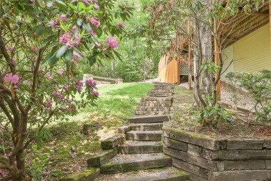 Discover comfort, convenience, and tranquil mountain living at on Sapphire National Golf Club in North Carolina - for sale on GolfHomes.com, golf home, golf lot