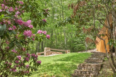 Discover comfort, convenience, and tranquil mountain living at on Sapphire National Golf Club in North Carolina - for sale on GolfHomes.com, golf home, golf lot