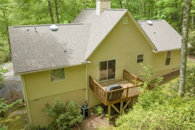 Discover comfort, convenience, and tranquil mountain living at on Sapphire National Golf Club in North Carolina - for sale on GolfHomes.com, golf home, golf lot