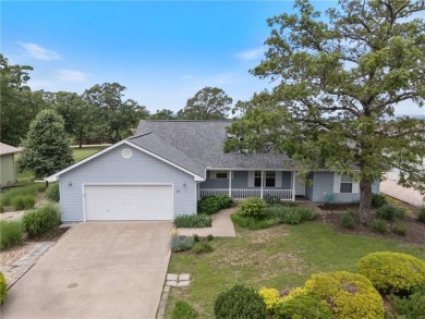 This immaculate 3 bed, 2 bath, 1,570 sq ft ranch-style home sits on Holiday Island Golf Course in Arkansas - for sale on GolfHomes.com, golf home, golf lot