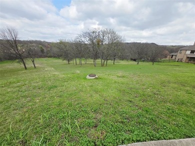 Build your dream home on this beautiful unimproved residential on Tangle Ridge Golf Club in Texas - for sale on GolfHomes.com, golf home, golf lot