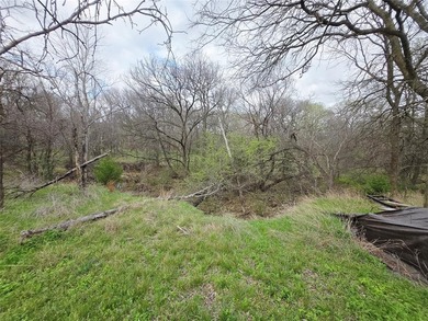 Build your dream home on this beautiful unimproved residential on Tangle Ridge Golf Club in Texas - for sale on GolfHomes.com, golf home, golf lot