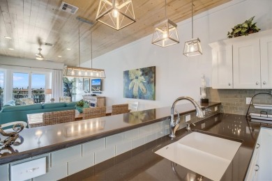 Wowza!! Fly in and enjoy your waterfront 4 story pristine, 3/3.5 on Palmilla Beach Golf Club in Texas - for sale on GolfHomes.com, golf home, golf lot