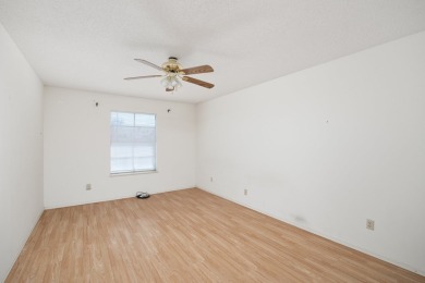 This delightful townhome offers a comfortable two-story layout on Harlingen Country Club in Texas - for sale on GolfHomes.com, golf home, golf lot