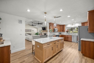 GOLFER'S PARADISE! Fully Remodeled 3 Bed/2 Bath Pool Home on Golden Hills Golf and Turf Club in Florida - for sale on GolfHomes.com, golf home, golf lot