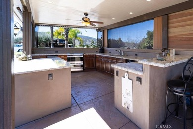 Stunning waterfront golf course property featuring a fully on  in California - for sale on GolfHomes.com, golf home, golf lot