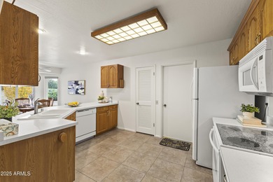 This home is designed for easy, low-maintenance living in a on Sun City Riverview Golf Course in Arizona - for sale on GolfHomes.com, golf home, golf lot