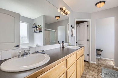 This beautiful 2-story home is situated on a spacious, 11,134 on Pelican Lakes Golf and Country Club in Colorado - for sale on GolfHomes.com, golf home, golf lot