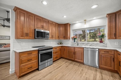 GOLFER'S PARADISE! Fully Remodeled 3 Bed/2 Bath Pool Home on Golden Hills Golf and Turf Club in Florida - for sale on GolfHomes.com, golf home, golf lot