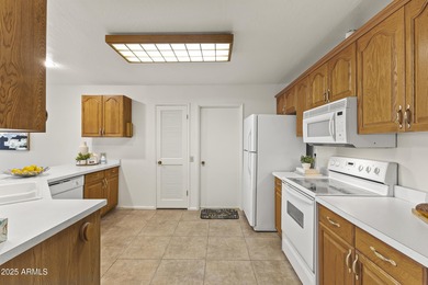 This home is designed for easy, low-maintenance living in a on Sun City Riverview Golf Course in Arizona - for sale on GolfHomes.com, golf home, golf lot