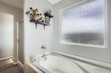 This beautiful 2-story home is situated on a spacious, 11,134 on Pelican Lakes Golf and Country Club in Colorado - for sale on GolfHomes.com, golf home, golf lot