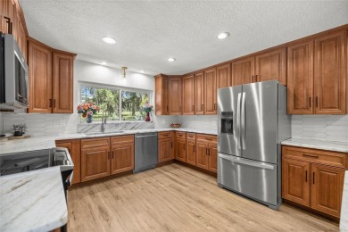 GOLFER'S PARADISE! Fully Remodeled 3 Bed/2 Bath Pool Home on Golden Hills Golf and Turf Club in Florida - for sale on GolfHomes.com, golf home, golf lot