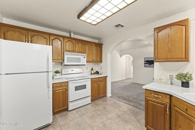 This home is designed for easy, low-maintenance living in a on Sun City Riverview Golf Course in Arizona - for sale on GolfHomes.com, golf home, golf lot