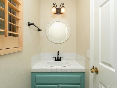 Come experience the charm of resort-style living with this on Pala Mesa Resort in California - for sale on GolfHomes.com, golf home, golf lot