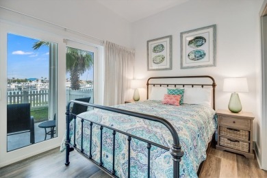 Wowza!! Fly in and enjoy your waterfront 4 story pristine, 3/3.5 on Palmilla Beach Golf Club in Texas - for sale on GolfHomes.com, golf home, golf lot