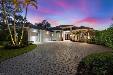 A masterfully renovated Watercrest in Pelican Marsh residence on Pelican Marsh Golf Club in Florida - for sale on GolfHomes.com, golf home, golf lot