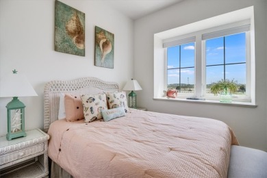 Wowza!! Fly in and enjoy your waterfront 4 story pristine, 3/3.5 on Palmilla Beach Golf Club in Texas - for sale on GolfHomes.com, golf home, golf lot