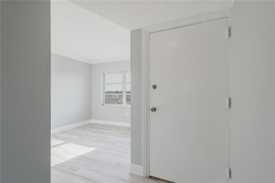 BEAUTIFULL REMODELED 2 BEDROOM 2 BATH CONDO - Enter through the on Seminole Lake Country Club in Florida - for sale on GolfHomes.com, golf home, golf lot