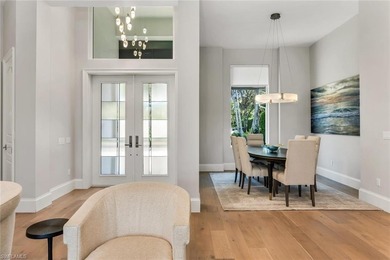 A masterfully renovated Watercrest in Pelican Marsh residence on Pelican Marsh Golf Club in Florida - for sale on GolfHomes.com, golf home, golf lot