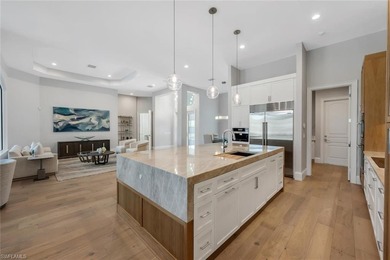 A masterfully renovated Watercrest in Pelican Marsh residence on Pelican Marsh Golf Club in Florida - for sale on GolfHomes.com, golf home, golf lot