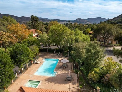 Come experience the charm of resort-style living with this on Pala Mesa Resort in California - for sale on GolfHomes.com, golf home, golf lot