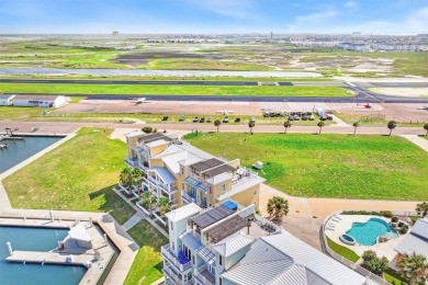 Wowza!! Fly in and enjoy your waterfront 4 story pristine, 3/3.5 on Palmilla Beach Golf Club in Texas - for sale on GolfHomes.com, golf home, golf lot