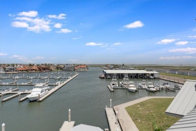 Wowza!! Fly in and enjoy your waterfront 4 story pristine, 3/3.5 on Palmilla Beach Golf Club in Texas - for sale on GolfHomes.com, golf home, golf lot