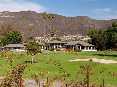 Come experience the charm of resort-style living with this on Pala Mesa Resort in California - for sale on GolfHomes.com, golf home, golf lot