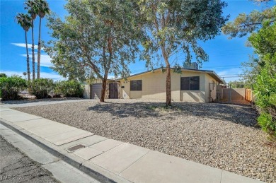 This lovely 3BD, 2BA, 2CAR mid-century Home with a modern flare on Las Vegas National Golf Club in Nevada - for sale on GolfHomes.com, golf home, golf lot