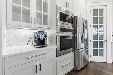 Experience refined luxury in this custom-built home in the on The Bull At Boones Trace in Kentucky - for sale on GolfHomes.com, golf home, golf lot