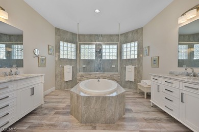 Nestled west of US-41 in the coveted, gated enclave of Fountain on Pelican Sound Golf and River Club in Florida - for sale on GolfHomes.com, golf home, golf lot