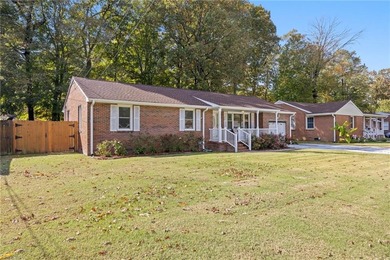 All-brick ranch on a picturesque Mayflower Park street, just two on Elizabeth Manor Golf and Country Club in Virginia - for sale on GolfHomes.com, golf home, golf lot
