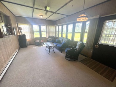 Ranch style stand-alone condo overlooking peaceful hole 4 of on Saddle Ridge Golf Club in Wisconsin - for sale on GolfHomes.com, golf home, golf lot